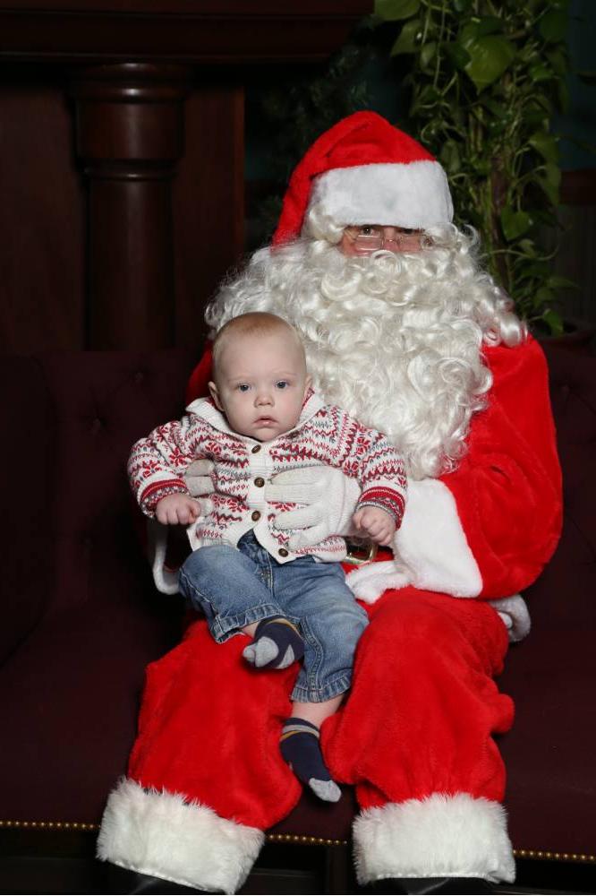 Littlest Laker poses with Santa